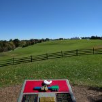 Memorial marks roughly the positioning of the stage at Yasgur Farms where the Woodstock Festival occured. The attendees would have been on the hill in the distance
